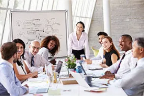 Team meeting discussing company payroll